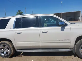 2015 Chevrolet Suburban LTZ with VIN 1GNSCKKC3FR113388, listed as a IAAI auction lot 41867964 with 238,530 mi miles and . Bid and sale history available at DreamBid. Image 14.