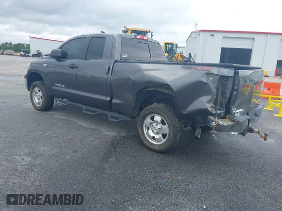 2012 Toyota Tundra z VIN 5TFUW5F10CX265994, wystawiony jako IAAI lot #42172968 z przebiegiem 197 493 mil mil oraz . Historia ofert i sprzedaży dostępna na DreamBid. Obrazek 3.
