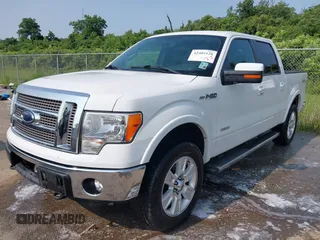 2012 Ford F-150 XL with VIN 1FTFW1ET3CFC30327, listed as a IAAI auction lot 42402128 with 214,410 mi miles and . Bid and sale history available at DreamBid. Image 2.