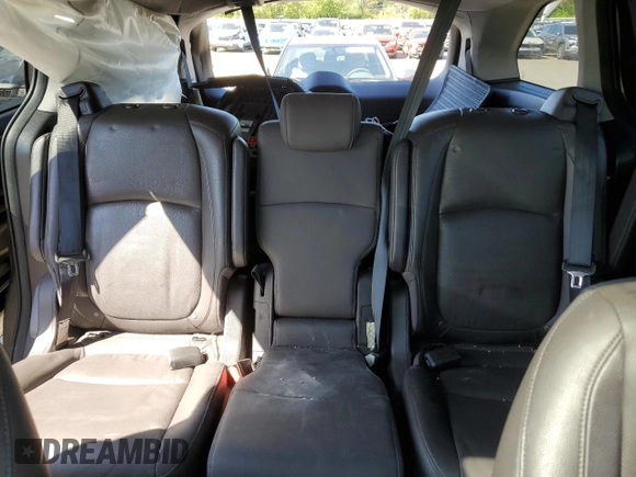 2018 Honda Odyssey EX-L z VIN 5FNRL6H71JB016424, wystawiony jako Copart lot #53859505 z przebiegiem 91 669 mil mil oraz Szkoda całkowita • Salvage title. Historia ofert i sprzedaży dostępna na DreamBid. Obrazek 10.