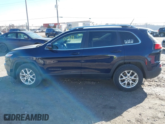2014 Jeep Cherokee Latitude z VIN 1C4PJMCS6EW145810, wystawiony jako IAAI lot #41802031 z przebiegiem 143 358 mil mil oraz . Historia ofert i sprzedaży dostępna na DreamBid. Obrazek 14.