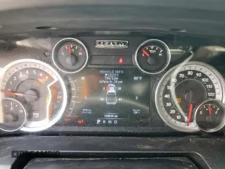 2015 Ram 1500 Outdoorsman z VIN 1C6RR6LT9FS566376, wystawiony jako Copart lot #57241255 z przebiegiem 130 919 mil mil oraz Szkoda całkowita • Salvage title. Historia ofert i sprzedaży dostępna na DreamBid. Obrazek 9.