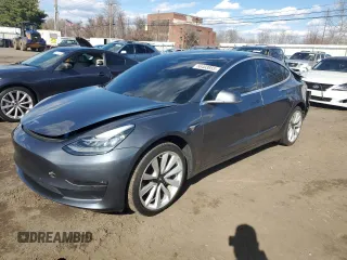 2019 Tesla Model 3 Mid Range with VIN 5YJ3E1EA6KF312754, listed as a Copart auction lot 50403855 with 148,217 mi miles and Salvage Title. Bid and sale history available at carsss.com. Image 1.