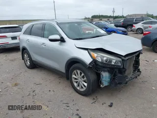 2017 Kia Sorento LX with VIN 5XYPG4A33HG297281, listed as a IAAI auction lot 41962658 with 127,795 mi miles. Bid and sale history available at carsss.com. Image 1.