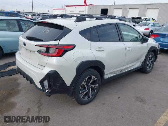 2024 Subaru Crosstrek Premium with VIN JF2GUADC0R8302580, listed as a IAAI auction lot 42087580 with 13,766 mi miles and . Bid and sale history available at DreamBid. Image 4.