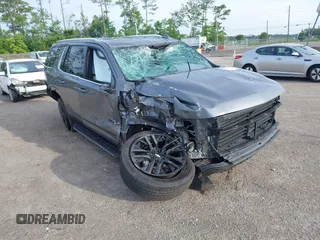 2021 Chevrolet Tahoe LT z VIN 1GNSKNKDXMR414928, wystawiony jako IAAI lot #42366959 z przebiegiem 88 060 mil mil oraz . Historia ofert i sprzedaży dostępna na DreamBid. Obrazek 1.