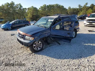 2002 Isuzu Rodeo S with VIN 4S2CK58W124307433, listed as a Copart auction lot 75447074 with 129,163 mi miles and Salvage Title. Bid and sale history available at DreamBid. Image 1.