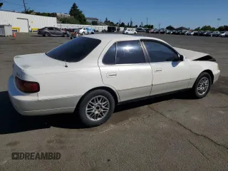 1996 Toyota Camry LE z VIN JT2BF12K3T0139807, wystawiony jako Copart lot #57675855 z przebiegiem 258 601 mil mil oraz Szkoda całkowita • Salvage title. Historia ofert i sprzedaży dostępna na DreamBid. Obrazek 3.