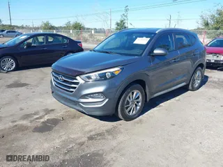 2017 Hyundai Tucson SE Plus with VIN KM8J33A45HU420349, listed as a IAAI auction lot 41296190 with 77,910 mi miles. Bid and sale history available at carsss.com. Image 17.