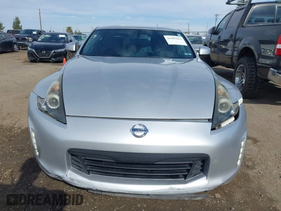 2018 Nissan 370Z Sport with VIN JN1AZ4EH7JM572602, listed as a IAAI auction lot 41902662 with 76,262 mi miles and . Bid and sale history available at DreamBid. Image 12.