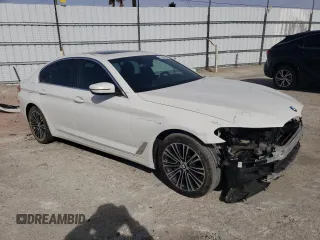 2020 BMW 5 Series 530e with VIN WBAJA9C0XLCD71591, listed as a Copart auction lot 79766234 with 115,358 mi miles and Salvage Title. Bid and sale history available at DreamBid. Image 4.