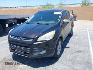 2013 Ford Escape SE z VIN 1FMCU0GX5DUA13261, wystawiony jako IAAI lot #42548111 z przebiegiem 183 037 mil mil oraz . Historia ofert i sprzedaży dostępna na DreamBid. Obrazek 2.