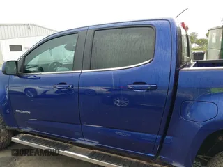 2016 Chevrolet Colorado 4WD LT z VIN 1GCGTCE39G1294903, wystawiony jako IAAI lot #42273278 z przebiegiem 84 909 mil mil oraz . Historia ofert i sprzedaży dostępna na DreamBid. Obrazek 14.