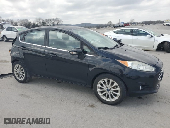 2017 Ford Fiesta Titanium with VIN 3FADP4FJXHM142648, listed as a Copart auction lot 48975125 with 82,042 mi miles and Salvage Title. Bid and sale history available at DreamBid. Image 4.
