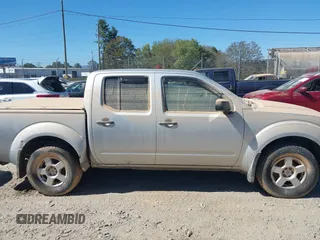 2006 Nissan Frontier SE z VIN 1N6AD07W36C443203, wystawiony jako IAAI lot #40571911 z przebiegiem Nie podano mil oraz . Historia ofert i sprzedaży dostępna na DreamBid. Obrazek 12.