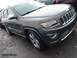 2014 Jeep Grand Cherokee Overland with VIN 1C4RJFCT2EC146239, listed as a IAAI auction lot 41368514 with 164,239 mi miles. Bid and sale history available at carsss.com. Image 1.