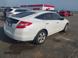 2010 Honda Crosstour EX-L z VIN 5J6TF1H51AL001055, wystawiony jako IAAI lot #42272313 z przebiegiem 228 485 mil mil oraz . Historia ofert i sprzedaży dostępna na DreamBid. Obrazek 4.