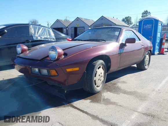 1984 Porsche 928 z VIN WP0JB0925ES860300, wystawiony jako IAAI lot #41581309 z przebiegiem 115 151 mil mil oraz . Historia ofert i sprzedaży dostępna na DreamBid. Obrazek 20.
