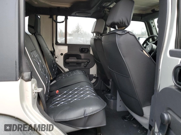 2007 Jeep Wrangler Unlimited X with VIN 1J4GA39177L105582, listed as a Copart auction lot 88912935 with 156,156 mi miles and Salvage Title. Bid and sale history available at DreamBid. Image 11.