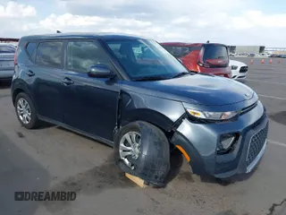 2020 Kia Soul LX with VIN KNDJ23AU7L7107950, listed as a IAAI auction lot 41963472 with 63,786 mi miles. Bid and sale history available at carsss.com. Image 1.