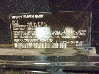 2015 BMW M3 with VIN WBS3C9C59FP806198, listed as a IAAI auction lot 41339037 with 89,610 mi miles. Bid and sale history available at carsss.com. Image 9.
