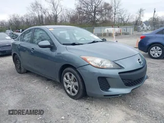 2012 Mazda Mazda3 i Sport with VIN JM1BL1UF0C1640650, listed as a IAAI auction lot 42019342 with 144,611 mi miles. Bid and sale history available at carsss.com. Image 1.