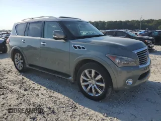 2011 Infiniti QX56 7-passenger with VIN JN8AZ2NE8B9006786, listed as a Copart auction lot 74598254 with 164,074 mi miles and Salvage Title. Bid and sale history available at carsss.com. Image 4.
