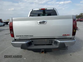 2012 GMC Canyon SLE1 with VIN 1GTH5MFE8C8156663, listed as a Copart auction lot 77385804 with 196,437 mi miles and Salvage Title. Bid and sale history available at carsss.com. Image 6.