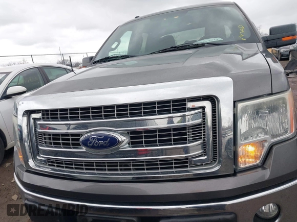 2013 Ford F-150 XL with VIN 1FTFW1CF5DKE32897, listed as a IAAI auction lot 41665756 with 101,574 mi miles. Bid and sale history available at carsss.com. Image 12.
