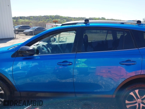 2017 Toyota RAV4 LE with VIN 2T3ZFREV2HW404424, listed as a IAAI auction lot 41862300 with 164,267 mi miles and . Bid and sale history available at carsss.com. Image 15.