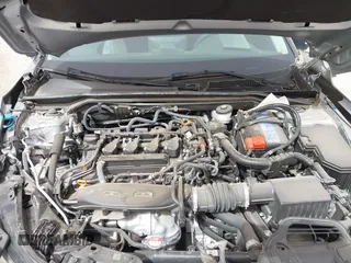 2023 Honda Civic EX with VIN 2HGFE1F77PH321210, listed as a IAAI auction lot 41797011 with 8,748 mi miles and . Bid and sale history available at DreamBid. Image 10.