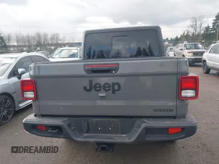 2021 Jeep Gladiator Willys with VIN 1C6HJTAG5ML616706, listed as a IAAI auction lot 41367142 with 50,951 mi miles and . Bid and sale history available at carsss.com. Image 16.