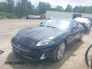 2012 Jaguar XK with VIN SAJWA4FB8CLB47049, listed as a IAAI auction lot 42118136 with 60,953 mi miles. Bid and sale history available at carsss.com. Image 17.