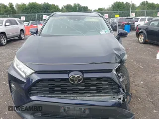 2019 Toyota RAV4 XLE with VIN 2T3P1RFVXKC057616, listed as a IAAI auction lot 42685158 with 148,661 mi miles and . Bid and sale history available at DreamBid. Image 13.