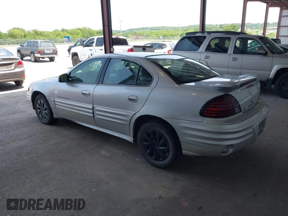 2001 Pontiac Grand Am SE with VIN 1G2NE52T81M648017, listed as a IAAI auction lot 42354372 with 206,086 mi miles and . Bid and sale history available at DreamBid. Image 3.