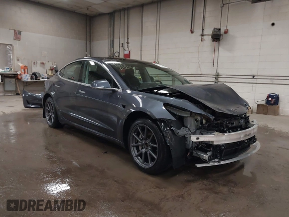 2020 Tesla Model 3 Long Range z VIN 5YJ3E1EB0LF800804, wystawiony jako IAAI lot #42137223 z przebiegiem 52 482 mil mil oraz . Historia ofert i sprzedaży dostępna na DreamBid. Obrazek 1.