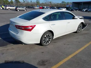 2018 Toyota Avalon XLE with VIN 4T1BK1EB8JU280176, listed as a IAAI auction lot 41632952 with 73,991 mi miles. Bid and sale history available at carsss.com. Image 4.