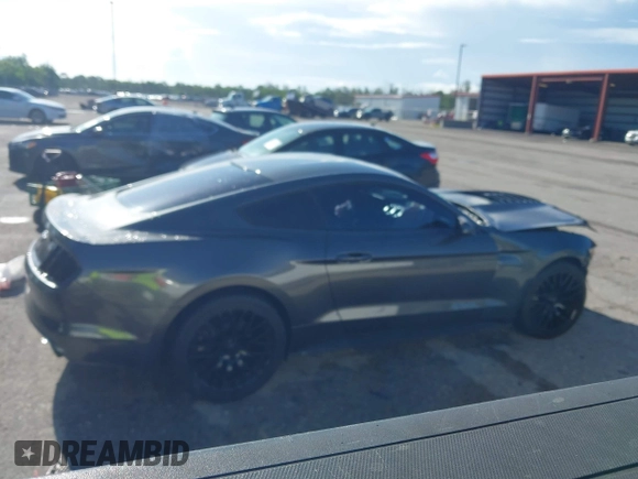 2017 Ford Mustang EcoBoost z VIN 1FA6P8TH5H5287023, wystawiony jako IAAI lot #42600833 z przebiegiem 103 685 mil mil oraz . Historia ofert i sprzedaży dostępna na DreamBid. Obrazek 14.
