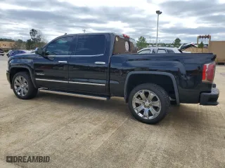2018 GMC Sierra 1500 Denali with VIN 3GTU2PEJ7JG573691, listed as a Copart auction lot 49163205 with 112,918 mi miles and Salvage Title. Bid and sale history available at carsss.com. Image 2.