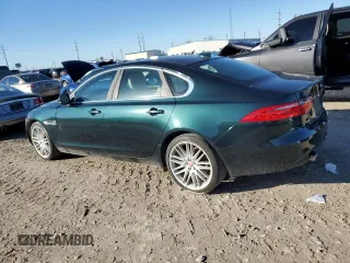 2017 Jaguar XF 35t Prestige with VIN SAJBE4BV2HCY34812, listed as a Copart auction lot 82416134 with 56,955 mi miles and Salvage Title. Bid and sale history available at carsss.com. Image 2.