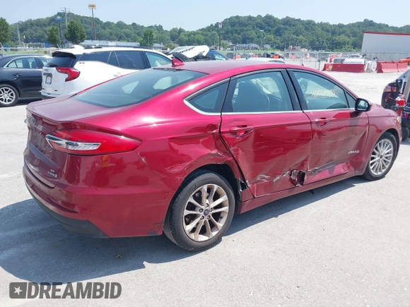 2019 Ford Fusion Hybrid SE with VIN 3FA6P0LU6KR243678, listed as a IAAI auction lot 40004890 with 138,533 mi miles. Bid and sale history available at carsss.com. Image 4.