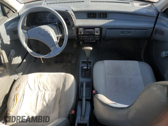 1990 Geo Metro z VIN JG1MR6467LK755382, wystawiony jako Copart lot #43056205 z przebiegiem 40 488 mil mil oraz Szkody całkowita. Historia ofert i sprzedaży dostępna na DreamBid. Obrazek 8.