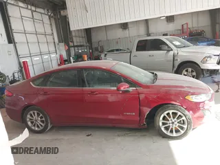 2019 Ford Fusion Hybrid SE with VIN 3FA6P0LUXKR205712, listed as a IAAI auction lot 41267049 with 124,687 mi miles. Bid and sale history available at carsss.com. Image 13.