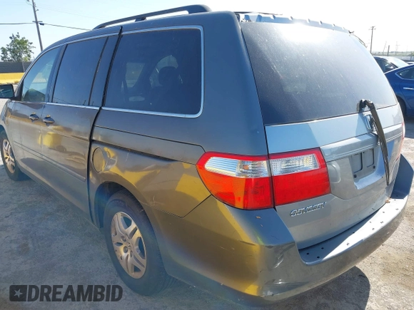 2007 Honda Odyssey EX-L z VIN 5FNRL38647B443269, wystawiony jako IAAI lot #42316300 z przebiegiem 121 616 mil mil oraz . Historia ofert i sprzedaży dostępna na DreamBid. Obrazek 3.
