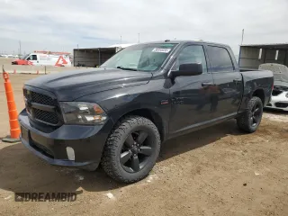 2018 Ram 1500 Express with VIN 3C6RR7KT4JG186482, listed as a Copart auction lot 56953035 with 124,976 mi miles and Salvage title. Bid and sale history available at DreamBid. Image 1.