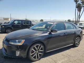 2014 Volkswagen Jetta GLI with VIN 3VW4T7AJXEM352920, listed as a Copart auction lot 63240295 with 63,790 mi miles and Salvage title. Bid and sale history available at DreamBid. Image 1.