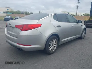 2013 Kia Optima LX with VIN KNAGM4A71D5414691, listed as a IAAI auction lot 41916576 with 245,851 mi miles. Bid and sale history available at carsss.com. Image 4.