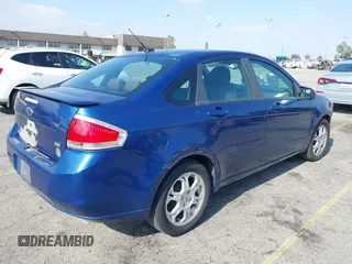 2009 Ford Focus SES with VIN 1FAHP36N89W125573, listed as a IAAI auction lot 42096198 with 214,092 mi miles and . Bid and sale history available at DreamBid. Image 4.