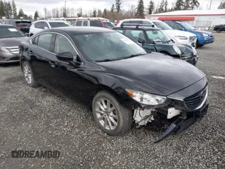 2016 Mazda Mazda6 i Sport with VIN JM1GJ1U58G1405227, listed as a IAAI auction lot 41798350 with 118,151 mi miles. Bid and sale history available at carsss.com. Image 1.