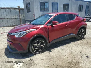 2018 Toyota C-HR XLE with VIN NMTKHMBX7JR011965, listed as a Copart auction lot 56213215 with 147,243 mi miles and Salvage Title. Bid and sale history available at DreamBid. Image 1.